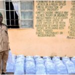 Current and Former Parliamentary Staff Chernor Sulaiman Bah and Mohamed Kargbo Donate Water to Makeni Correctional Center